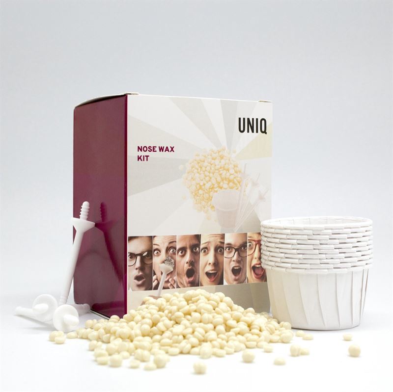 The UNIQ Nose Wax Kit by UNIQ provides easy nose hair removal with white wax beads, plastic applicators, paper cups, and fun packaging featuring expressive faces and Nose Wax Kit text.
